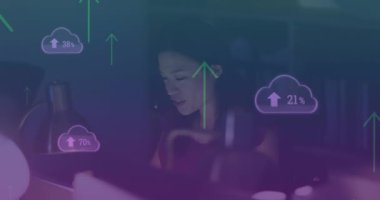 Animation of clouds, arrows and data processing over biracial businesswoman. Global business, finances, cloud computing and data processing concept digitally generated video.
