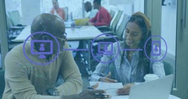 Animation of icons and data processing over diverse business people. Global business, finances, computing and data processing concept digitally generated video.