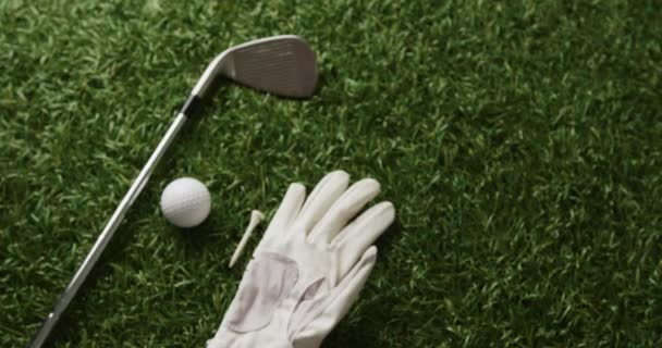 Close Golf Club Ball Glove Grass Copy Space Slow Motion — Stockvideo