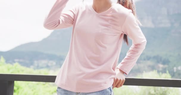 Slow Motion Video Biracial Woman Wearing Pink Long Sleeve Shirt — Stock videók