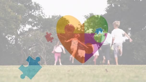 Animation Puzzle Heart Diverse Schoolchildren Running Autism Awareness Month Celebration – stockvideo