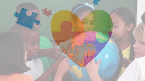 Animation Puzzle Pieces Heart Icon Diverse Schoolchildren Autism Awareness Month — стоковое видео