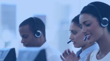Animation of childrens book week text over diverse business people using phone headsets. Global business and digital interface concept digitally generated video.