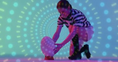 Animation of neon pattern over female rugby player on neon background. Sports and communication concept digitally generated video.