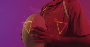 Animation of neon triangles over female rugby player on neon background. Sports and communication concept digitally generated video.