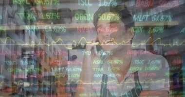 Animation of stock market data processing over caucasian male waiter talking on smartphone. Global economy and business technology concept