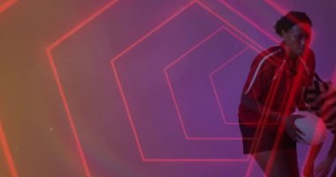 Animation of neon pattern over female rugby players on neon background. Sports and communication concept digitally generated video.