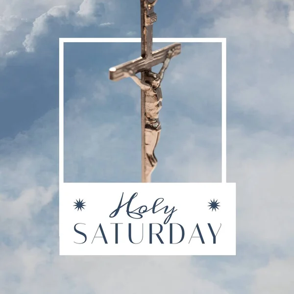 Composition of holy saturday text and christian cross. Easter, religion and faith concept digitally generated image.