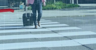 Animation of financial data processing with red lines over businessman crossing road. Global business, finances, computing and data processing concept digitally generated video.