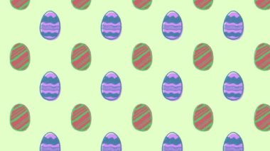 Animation of easter eggs on green background. Easter, tradition and celebration concept digitally generated video.