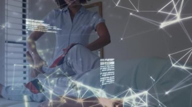 Animation of connections and data processing over diverse doctor and patient exercising. Medicine, healthcare and lifestyle concept digitally generated video.