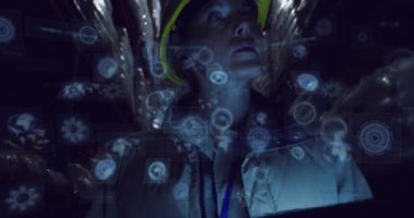 Animation of data processing with scope scanning over caucasian female worker in warehouse. Global connections, computing and digital interface concept digitally generated video.