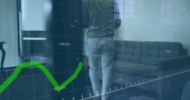 Animation of financial data processing with green line over diverse business people. Global business, finances, computing and data processing concept digitally generated video.