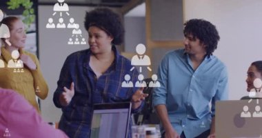 Animation of networking icons and data processing over diverse business people. Global networks, business, finances, computing and data processing concept digitally generated video.