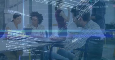 Animation of financial data processing over caucasian disable man on wheelchair working at office. Global economy and business technology concept