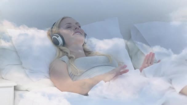 Animation Clouds Moving Caucasian Woman Eyes Closed Listening Music While — Vídeo de Stock