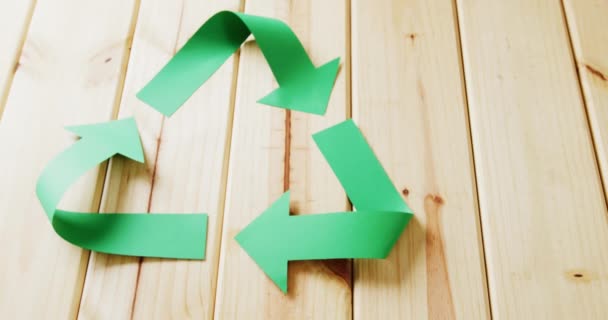 Close Recycling Symbol Green Paper Arrows Wooden Background Copy Space — Video Stock