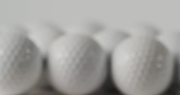 Close Golf Balls White Background Copy Space Slow Motion Golf — Αρχείο Βίντεο