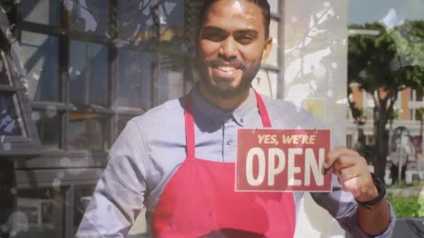 Animation Portrait Biracial Male Shop Assistant Open Sign Leaves Global — Video Stock