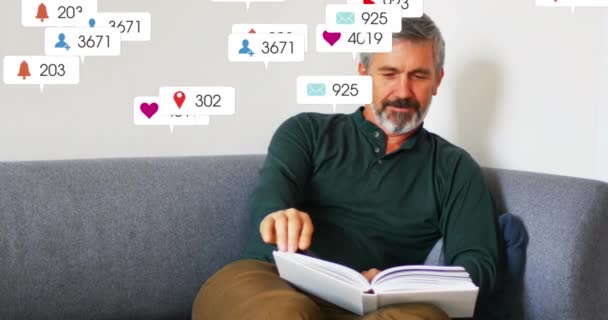 Animation Multiple Social Media Icons Caucasian Senior Man Reading Book — Stockvideo