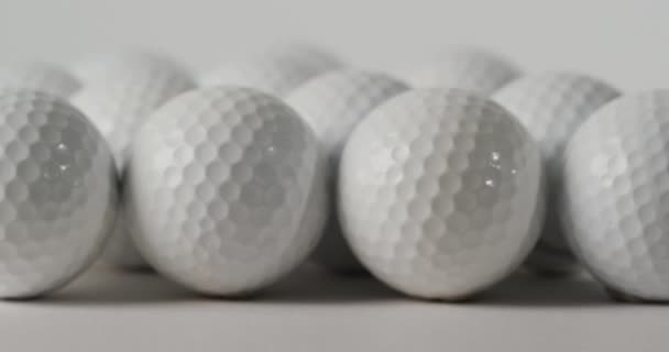 Close Golf Balls White Background Copy Space Slow Motion Golf — Stockvideo