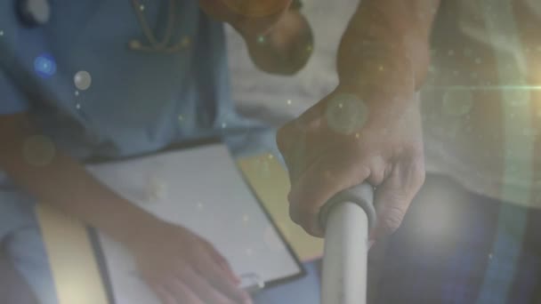 Animation Light Spots Diverse Doctor Patient Holding Hand Medicine Healthcare — ストック動画