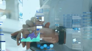 Animation of statistical data processing against mid section of a businessman using smartwatch. Business data technology concept