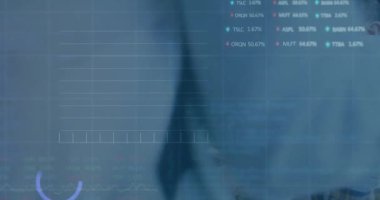 Animation of stock market data processing over diverse colleagues having a meeting at office. Global economy and business technology concept