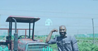 Animation of financial data processing over african american male farmer by tractor. Global business, finances, computing and data processing concept digitally generated video.