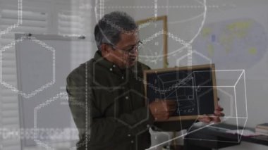 Animation of mathematical equations over biracial male teacher holding blackboard. Global education, learning and digital interface concept digitally generated video.