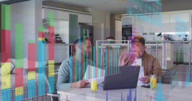 Animation of financial data processing over diverse male couple using laptop. Finances, lifestyle and digital interface concept digitally generated video.