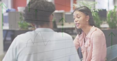 Animation of financial data processing over diverse business people in office. Global business, finances, computing and data processing concept digitally generated video.