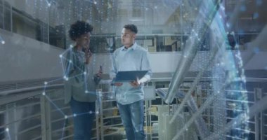 Animation of globe and data processing over diverse business people in office. Global business, finances, computing and data processing concept digitally generated video.