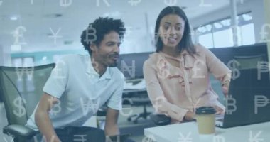 Animation of currency symbols data processing over diverse business people working in office. Global business, finances, computing and data processing concept digitally generated video.