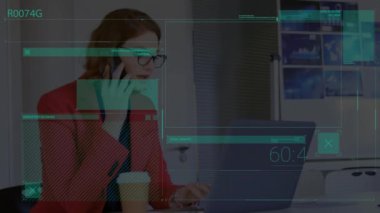 Animation of data processing over caucasian businesswoman using laptop and smartphone. Global business, technology and digital interface concept digitally generated video.