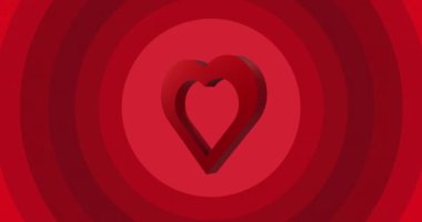 Animation of red heart over circles on red background. Valentine's day, love and celebration concept digitally generated video.