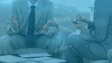 Animation of globe and financial data processing over diverse business people. Global business, finances, computing and data processing concept digitally generated video.