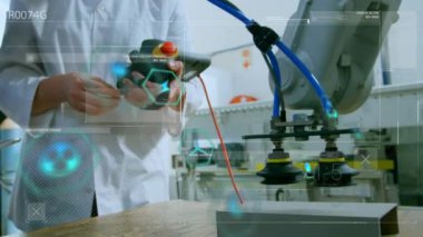Engineers testing a robotic machine in a warehouse. Global science and technology concept digitally generated video.