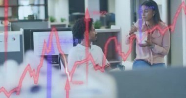 Animation of financial data processing and arrows over diverse business people in office. Global business, finances, computing and data processing concept digitally generated video.