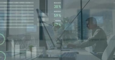 Animation of financial data processing over caucasian businessman working at office. Global business, finances and digital interface concept digitally generated video.