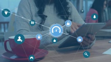 A casual businesswoman using her tablet in an office setting. Global connections cooperation in business and technology concept digitally generated video.