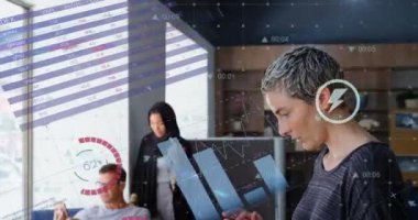 Animation of financial data processing over diverse business people using technological devices. Global business, finances and digital interface concept digitally generated video.