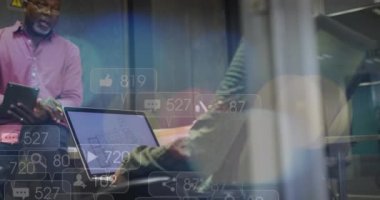 Animation of financial data processing over diverse business people in office. Global business, finances, computing and data processing concept digitally generated video.