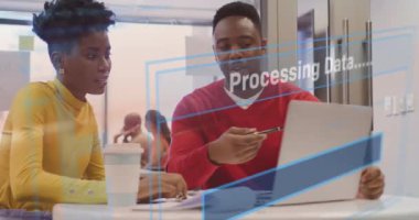 Animation of data processing text over diverse business people working in office. Global business, finances, computing and data processing concept digitally generated video.