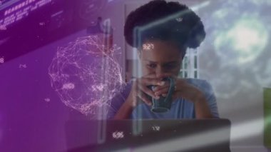 Animation of data processing with network and globe over african american woman using laptop. Global connections, digital interface, computing and data processing concept digitally generated video.