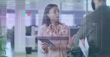 Animation of financial data processing over diverse business people working in office. Global business, finances, computing and data processing concept digitally generated video.