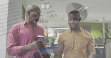 Animation of financial data processing over diverse businessmen in office. Global business, finances, computing and data processing concept digitally generated video.