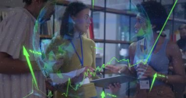 Animation of data processing and globe over diverse business people working in office. Global business, finances, computing and data processing concept digitally generated video.