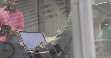 Animation of financial data processing over diverse business people in office. Global business, finances, computing and data processing concept digitally generated video.