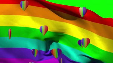 Animation of rainbow hearts and flag on green background. Valentine's day, love and celebration concept digitally generated video.